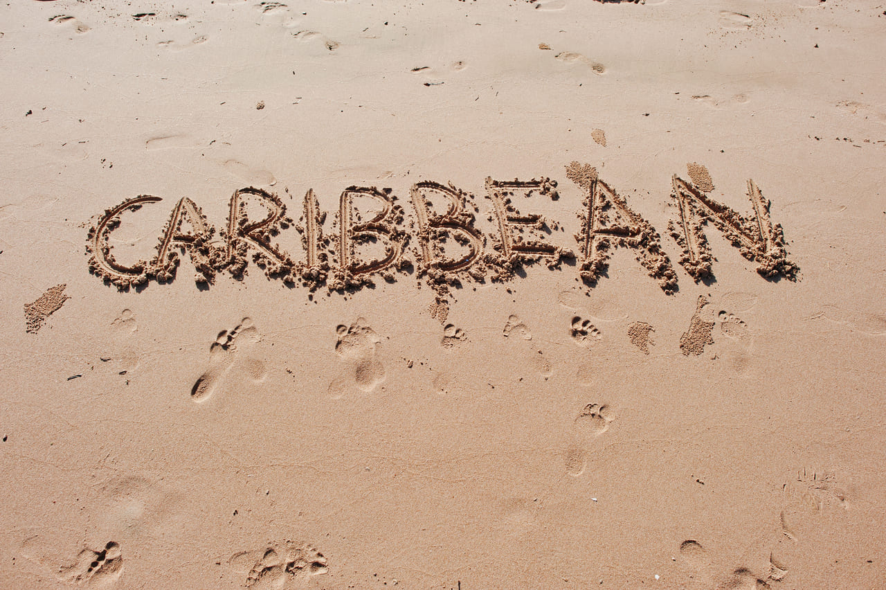 caribbean written in the sand on the beach 2022 02 06 07 45 04 utc