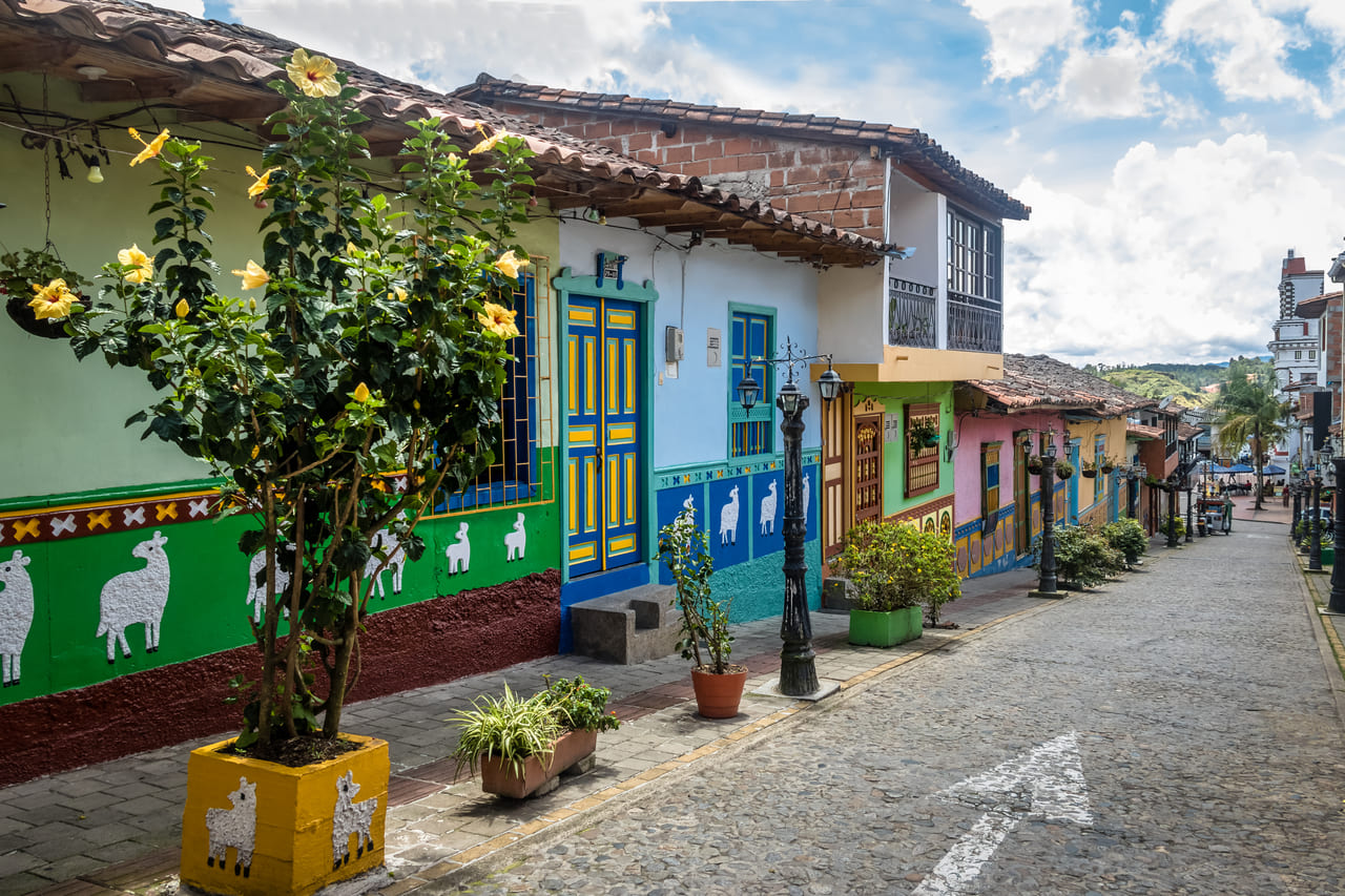 colorful houses on a cobblestone street guatape 2022 03 09 20 32 00 utc