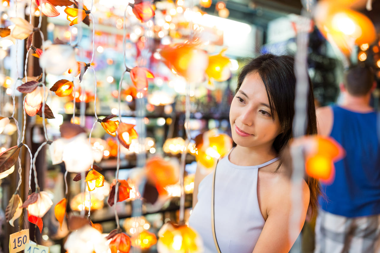 young woman shopping at bangkok market 2022 09 16 03 39 33 utc