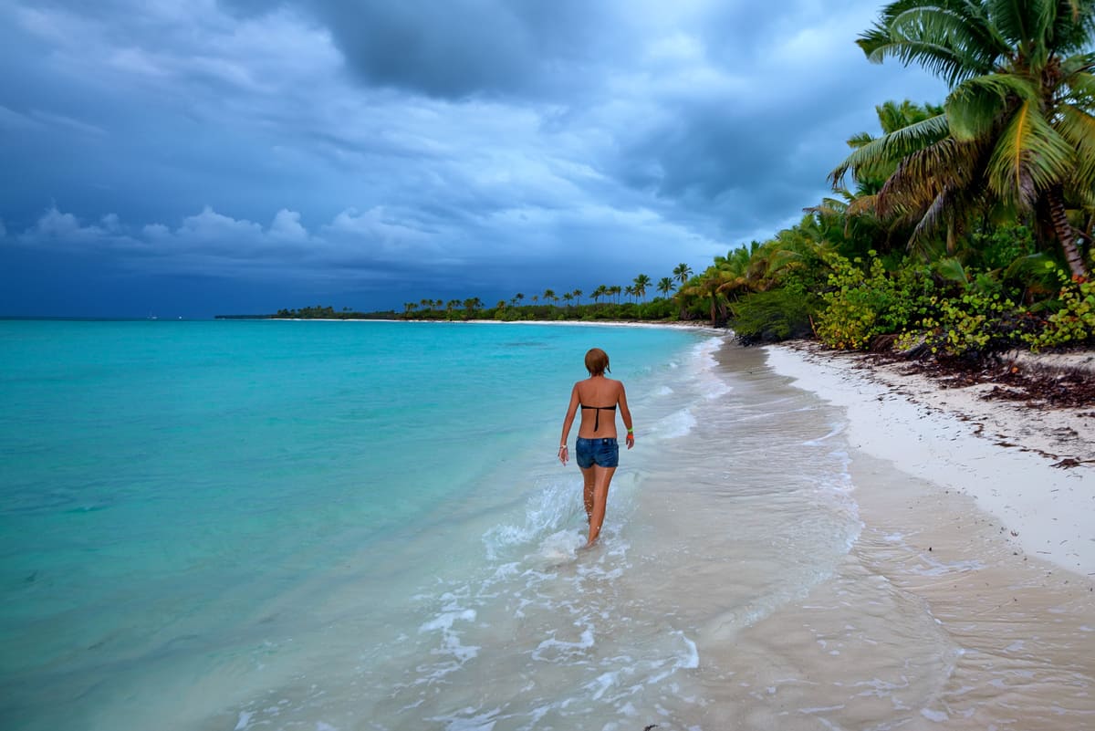 teenage girl walks on beach in dominican republic 2021 08 30 02 25 08 utc(2)(2)