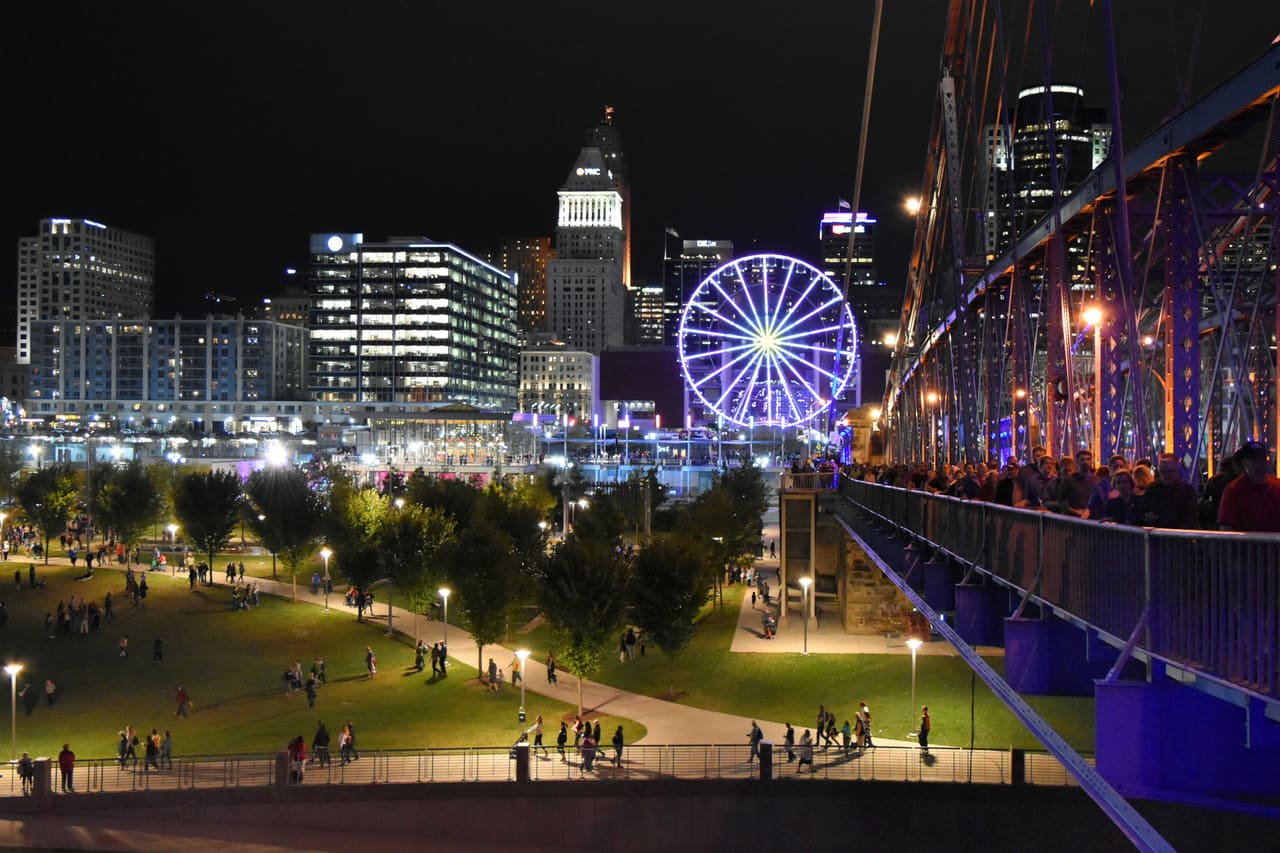 tiny people in riverfront park at night lit up br 2022 11 02 17 37 43 utc